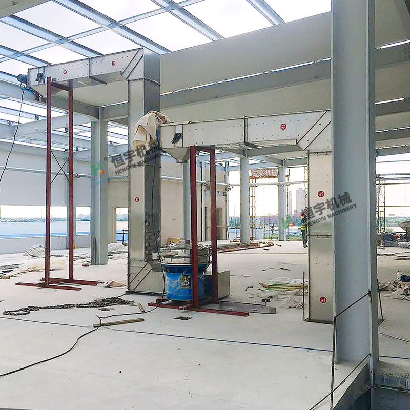 Z bucket elevator using scene